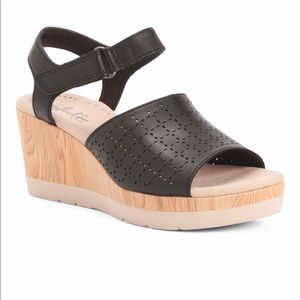 New in box Clarks perforated leather wedges